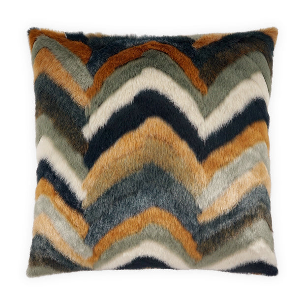 Multicolored zigzag patterned pillow with a faux fur texture