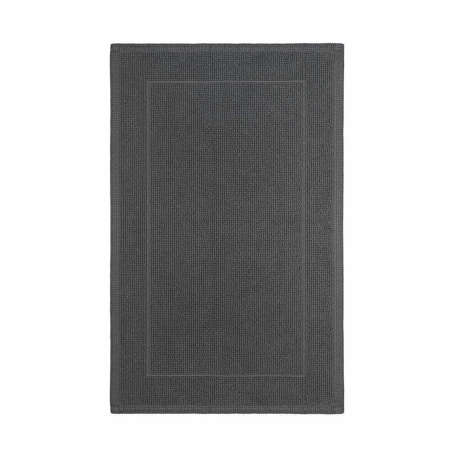 Gray Graccioza Egoist bath mat with plush, absorbent fabric, designed for comfort and style in modern bathrooms.