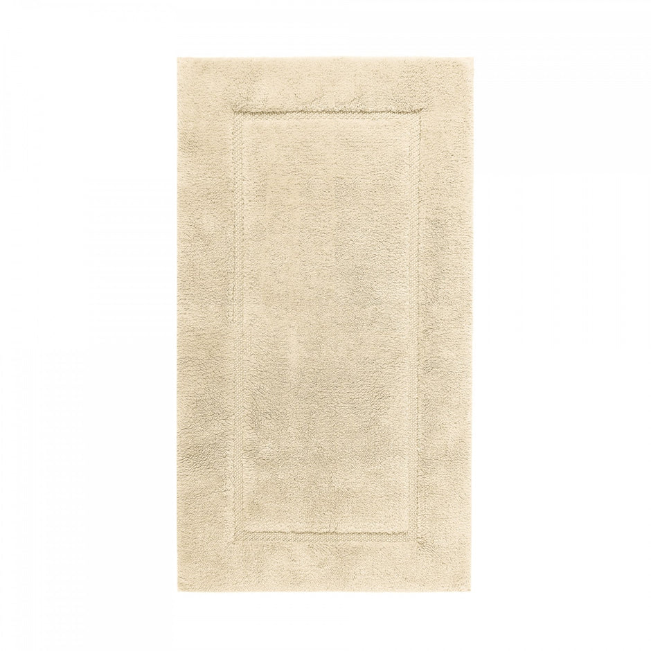 Graccioza Egoist bath rug in white, 28x47 inches, soft plush fabric with textured design for bathroom decor.