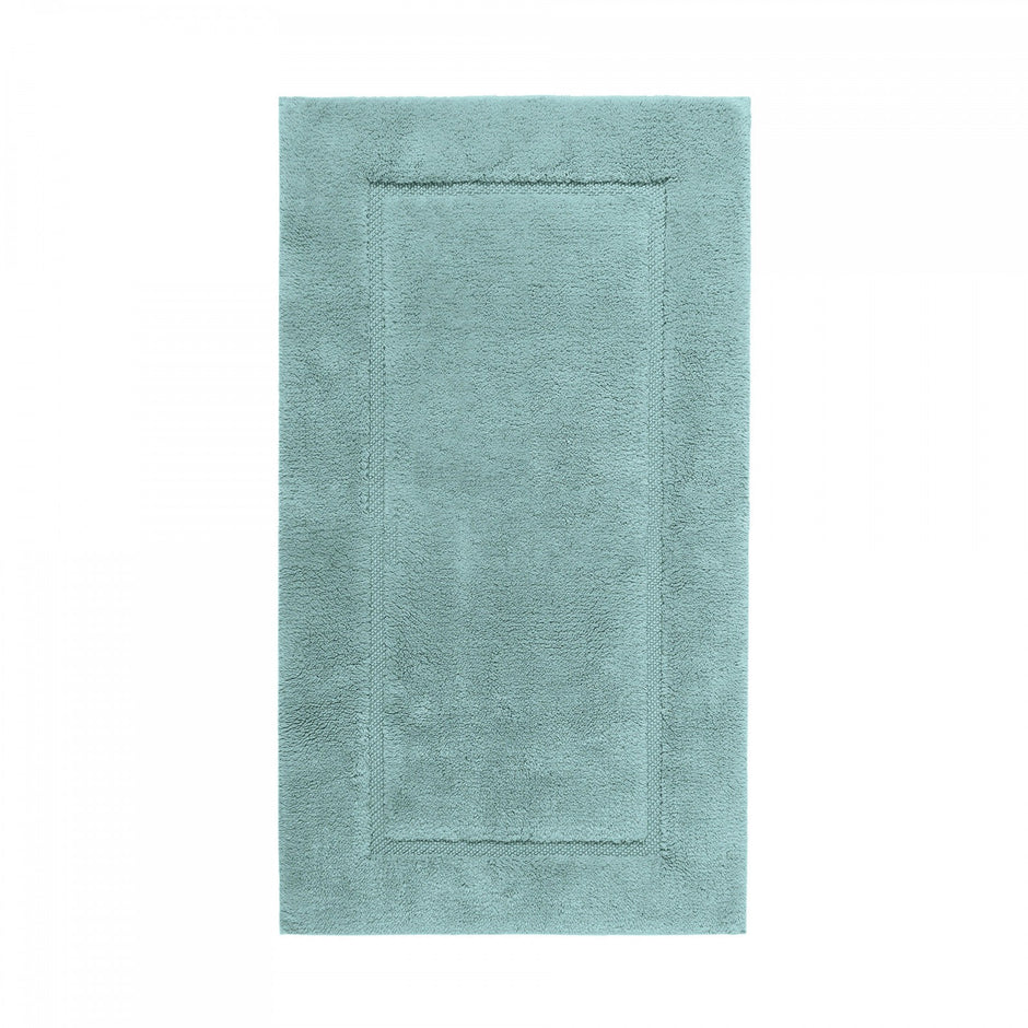 Graccioza Egoist bath rug in beige, 28x47 inches, soft textured fabric for bathroom decor and comfort.