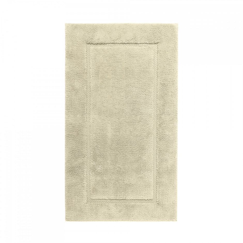 Graccioza Egoist bath rug in 28x47 inches with plush, textured surface for bathroom decor and comfort.