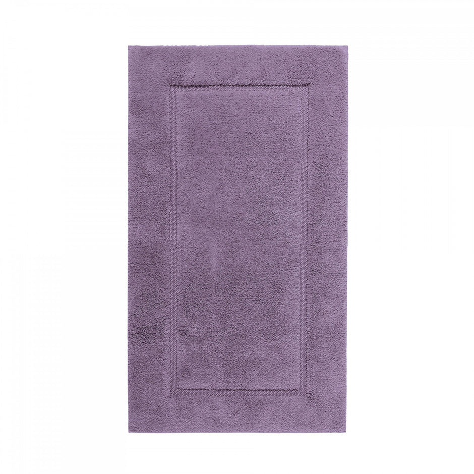 Gray Graccioza Egoist bath rug measuring 28x47 inches, soft and plush with a textured surface for bathroom comfort.