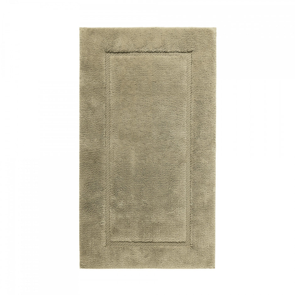 Graccioza Egoist bath rug in 28x47 inches with plush, textured white fabric for bathroom decor and comfort.
