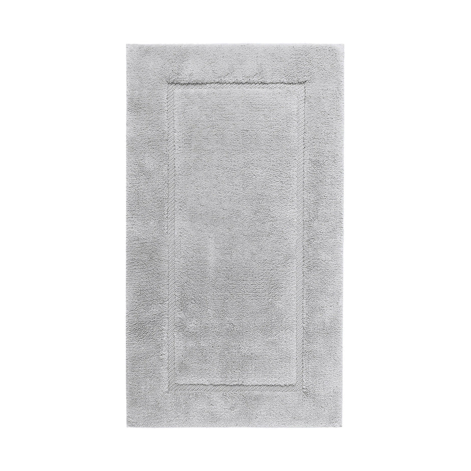 Graccioza Egoist bath rug in 28x47 inches with plush texture and neutral color, ideal for bathroom decor.
