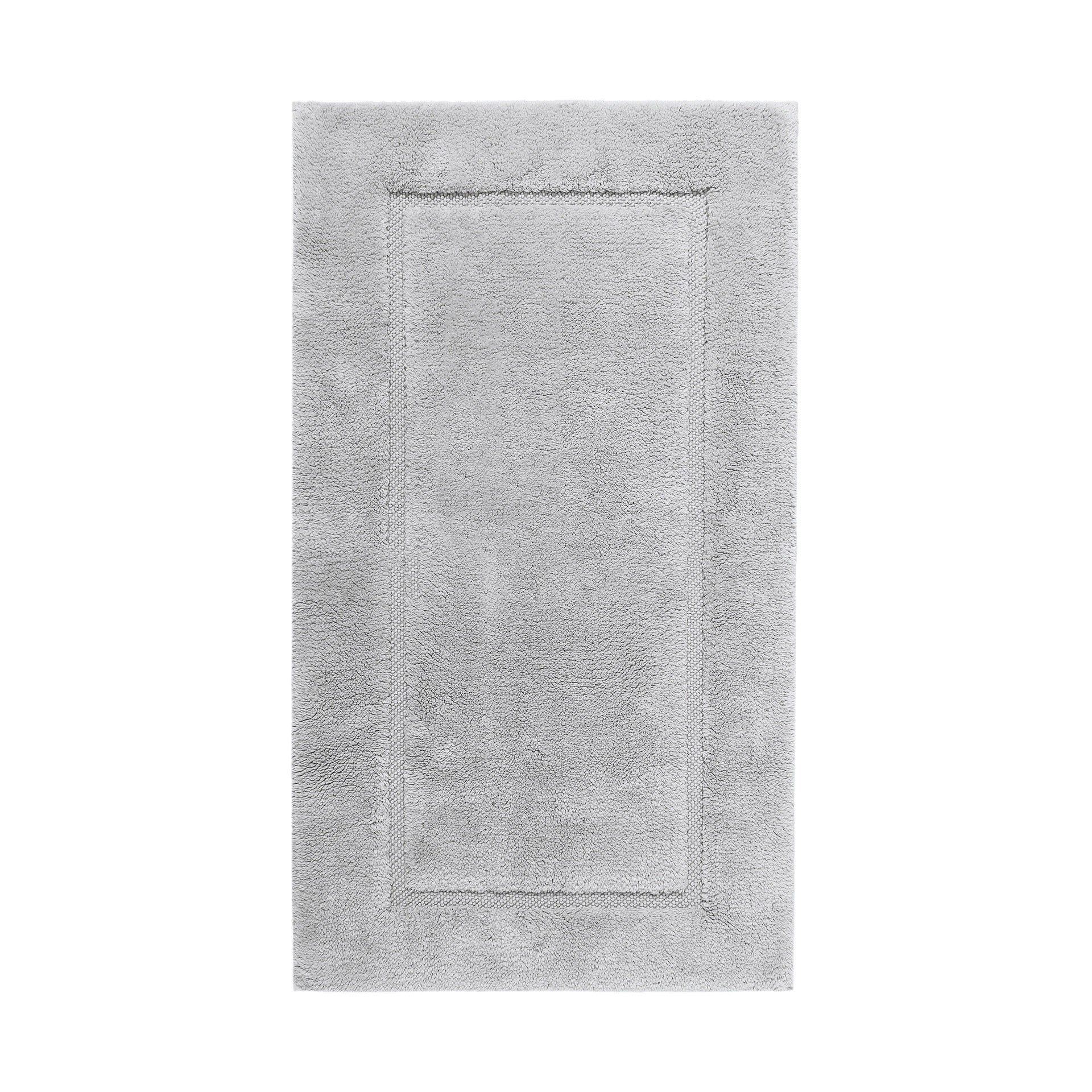 Graccioza Egoist bath rug in 28x47 inches with plush texture and neutral color, ideal for bathroom decor.