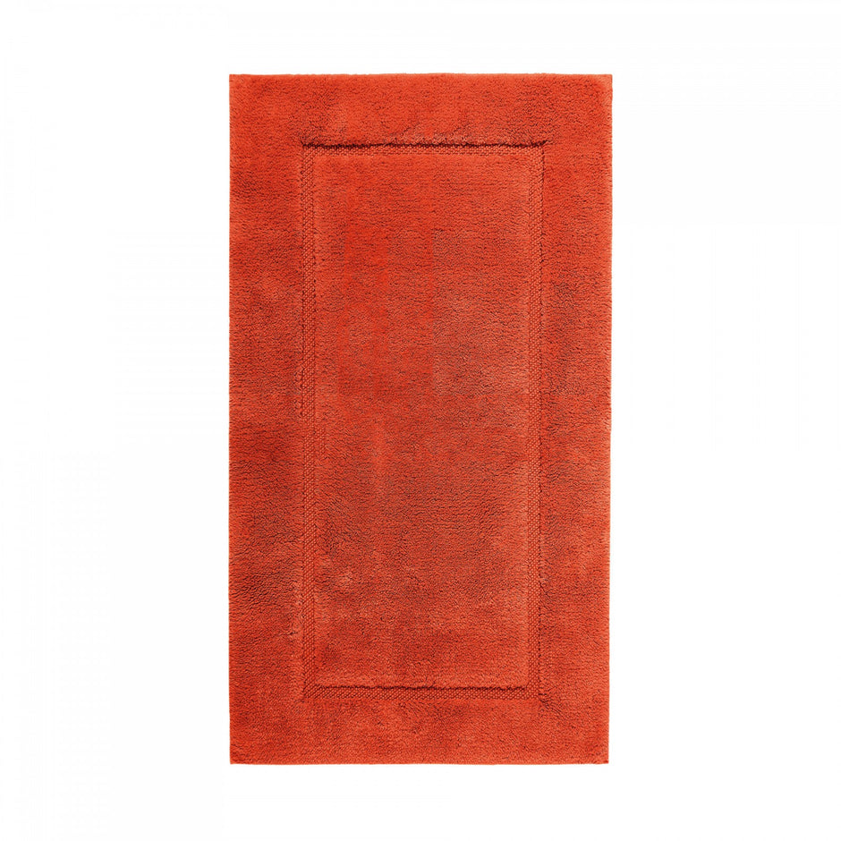 Graccioza Egoist bath rug in beige with textured, plush surface, measuring 28x47 inches, designed for bathroom comfort and style