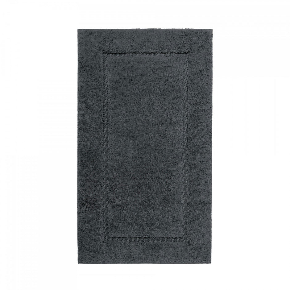 Graccioza Egoist bath rug in white, 28x47 inches, plush fabric with textured pattern, designed for bathroom decor and comfort
