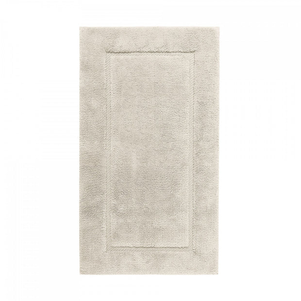 Graccioza Egoist bath rug in natural color, plush 20x31 inch bath mat featuring soft, absorbent fabric for bathroom comfort.