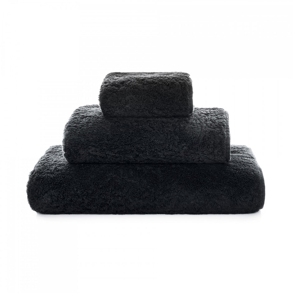 Graccioza Egoist hand towel with plush, soft fabric and subtle textured pattern, displayed folded on a neutral background.