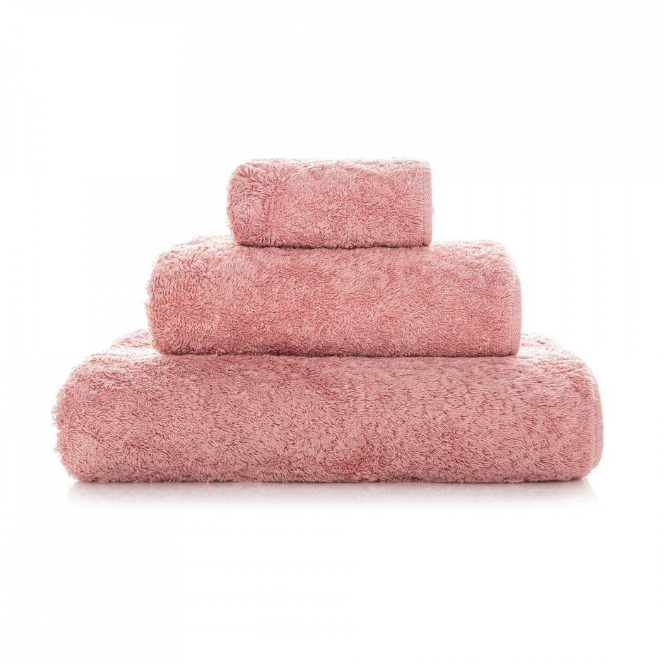 Gray Graccioza Egoist hand towel with soft, plush fabric, displayed folded on a white surface.