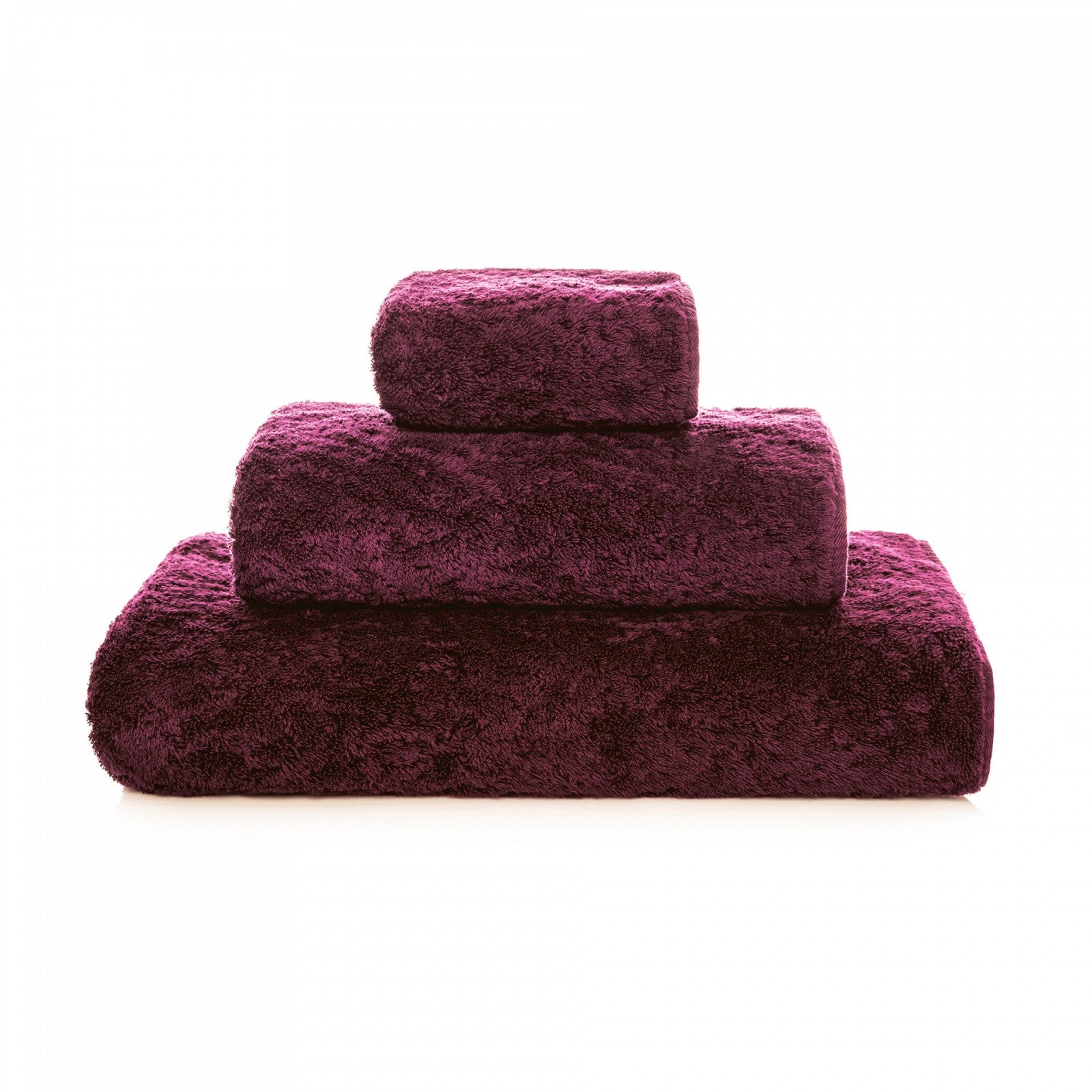 Soft white Graccioza Egoist hand towel with plush texture, displayed folded on a clean bathroom surface.