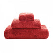 Soft white Graccioza Egoist hand towel with textured woven design, displayed folded on a neutral surface.