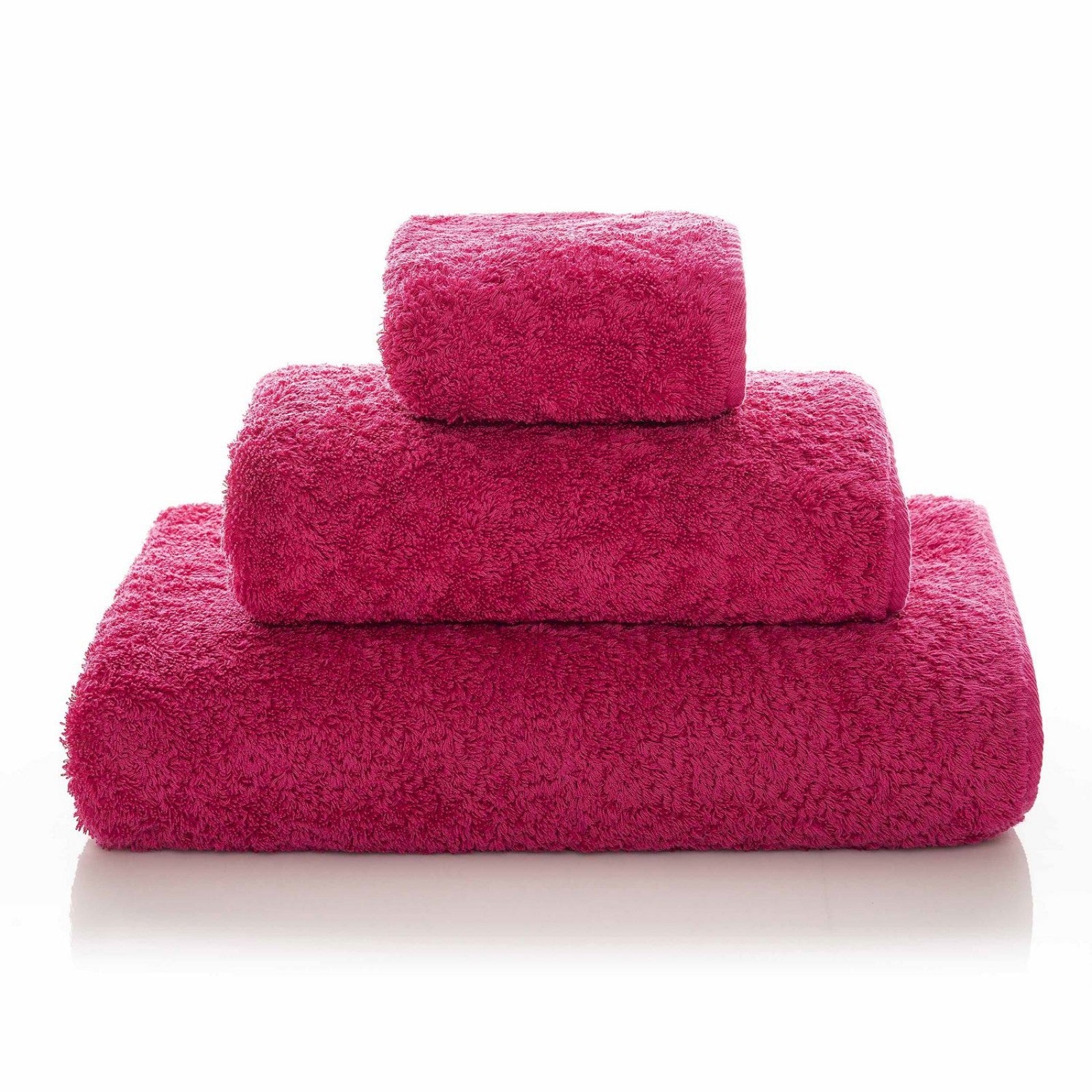 Soft beige Graccioza Egoist hand towel with textured pattern, folded neatly for display.