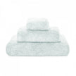 Graccioza Egoist hand towel in soft, plush fabric with a subtle pattern, displayed folded on a clean bathroom surface.