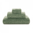 Soft white Graccioza Egoist hand towel with plush texture, displayed folded on a clean bathroom surface.