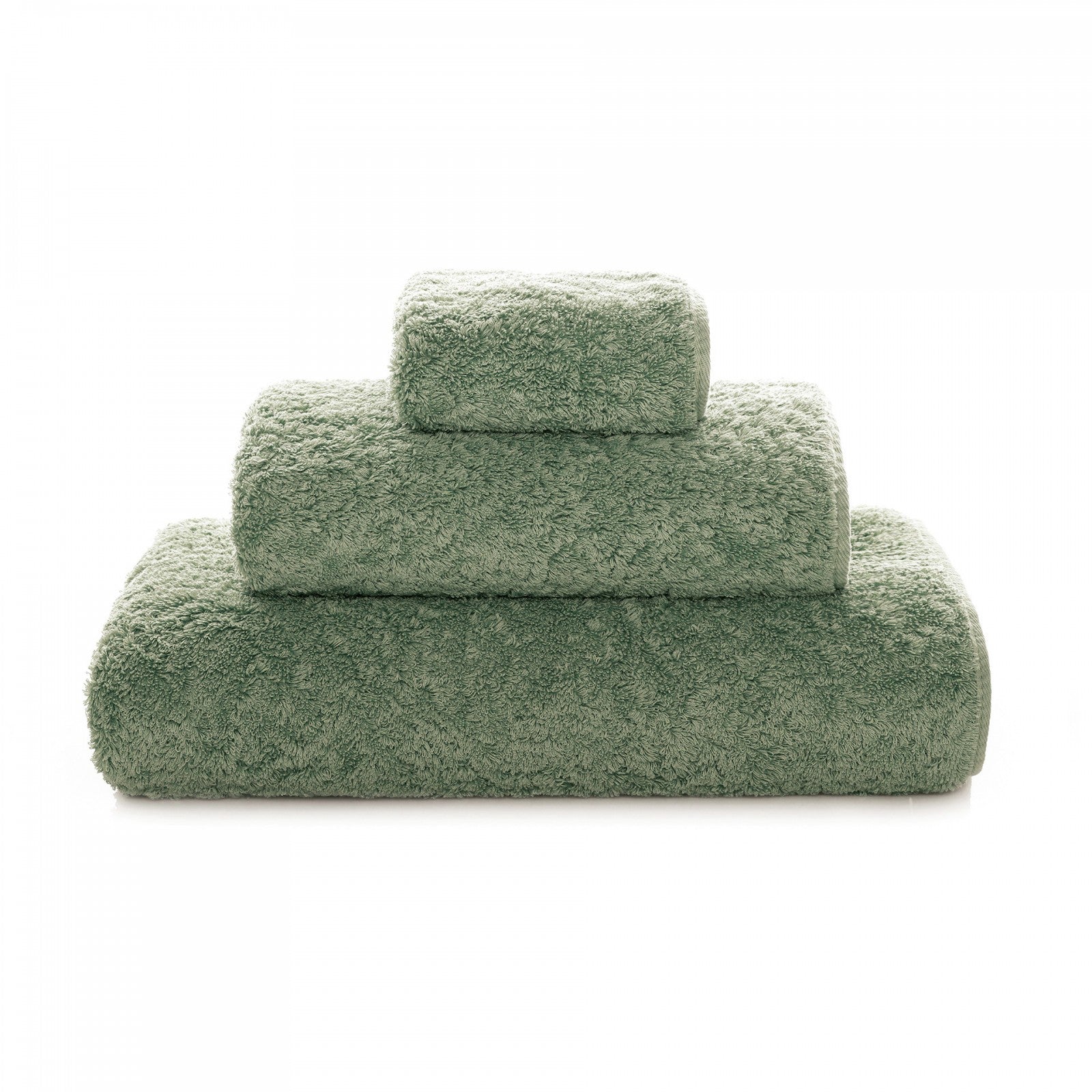 Soft white Graccioza Egoist hand towel with plush texture, displayed folded on a clean bathroom surface.