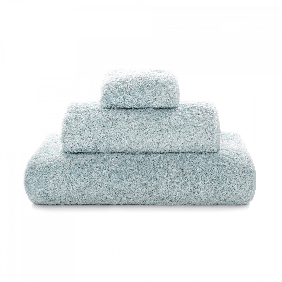 White Graccioza Egoist hand towel with soft, plush fabric, featuring a subtle textured pattern for a stylish bathroom accessory.