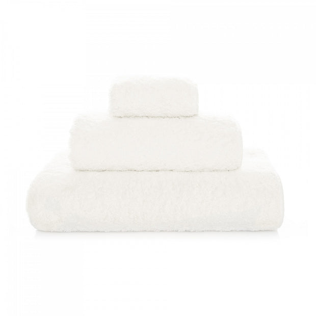 Graccioza Egoist washcloth in soft fog color, made of plush fabric, featuring a textured surface for gentle cleansing.