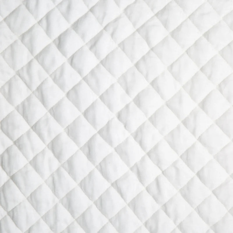 Queen-sized Bell Notte quilted silk velvet coverlet in winter white with a luxurious, textured quilted design.