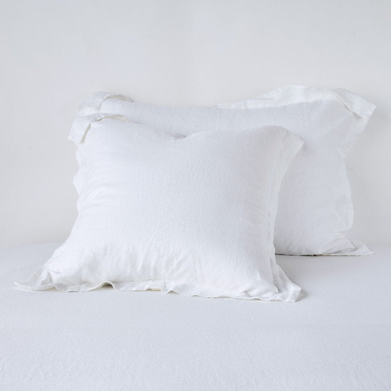White linen standard sham by Bella Notte, featuring soft, textured fabric and elegant design, ideal for a cozy bedroom decor.