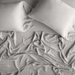 King size Bella Notte Madera Luxe Pillowcase in Moonlight fabric, showcasing soft, luxurious bedding with detailed stitching.