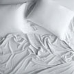 In Stock Bella Notte Madera Luxe Pillowcase Moonlight in standard size, soft fabric with elegant design and luxurious texture.