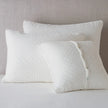 Deluxe quilted silk velvet sham in winter white by Bella Notte, showcasing soft, plush fabric with elegant quilting details.