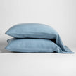 In Stock Bella Notte Madera Luxe pillowcase in Tahoe Blue, standard size, soft fabric, with elegant design.