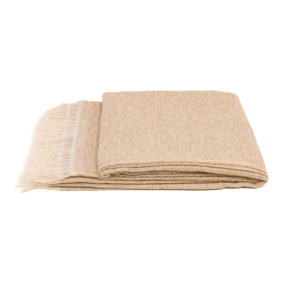 White Uniq'uity Allen throw blanket featuring soft, cozy fabric, perfect for adding warmth and style to your living space.