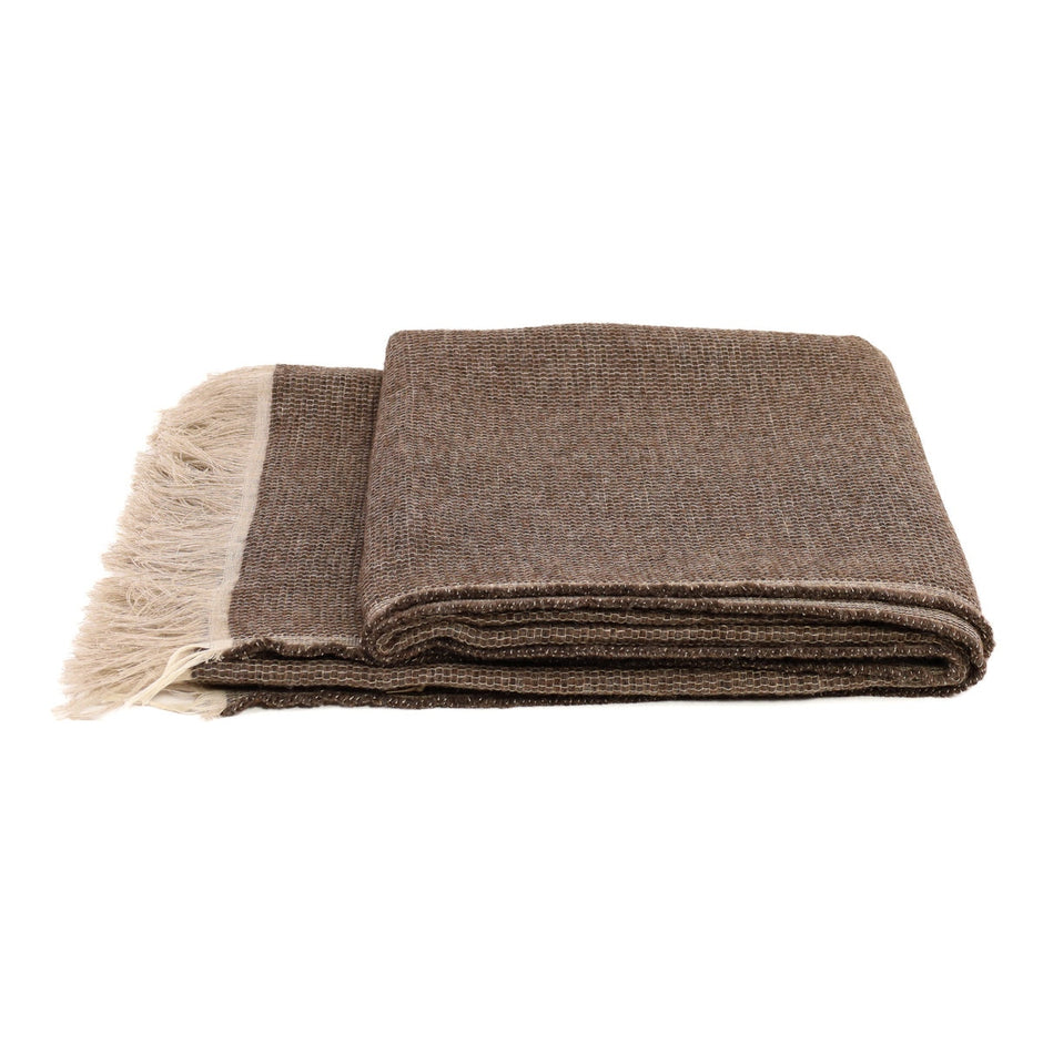 White Uniq'uity Allen throw blanket featuring soft, cozy fabric and simple design, ideal for adding comfort to any space.