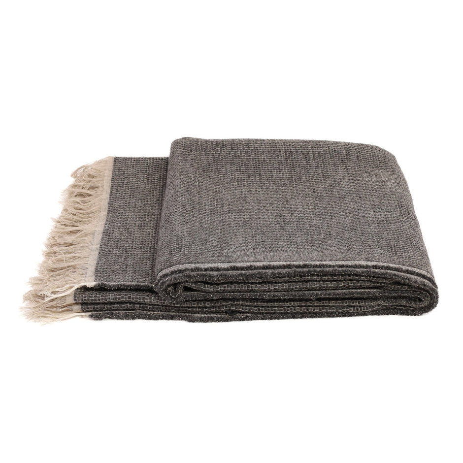 White Uniq'uity Allen throw blanket showcasing soft, cozy fabric and stylish design for comfortable home decor.
