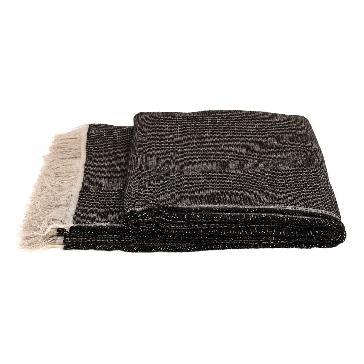 White Uniq'uity Allen throw blanket, soft and cozy fabric, displayed folded with textured surface for home decor and comfort.