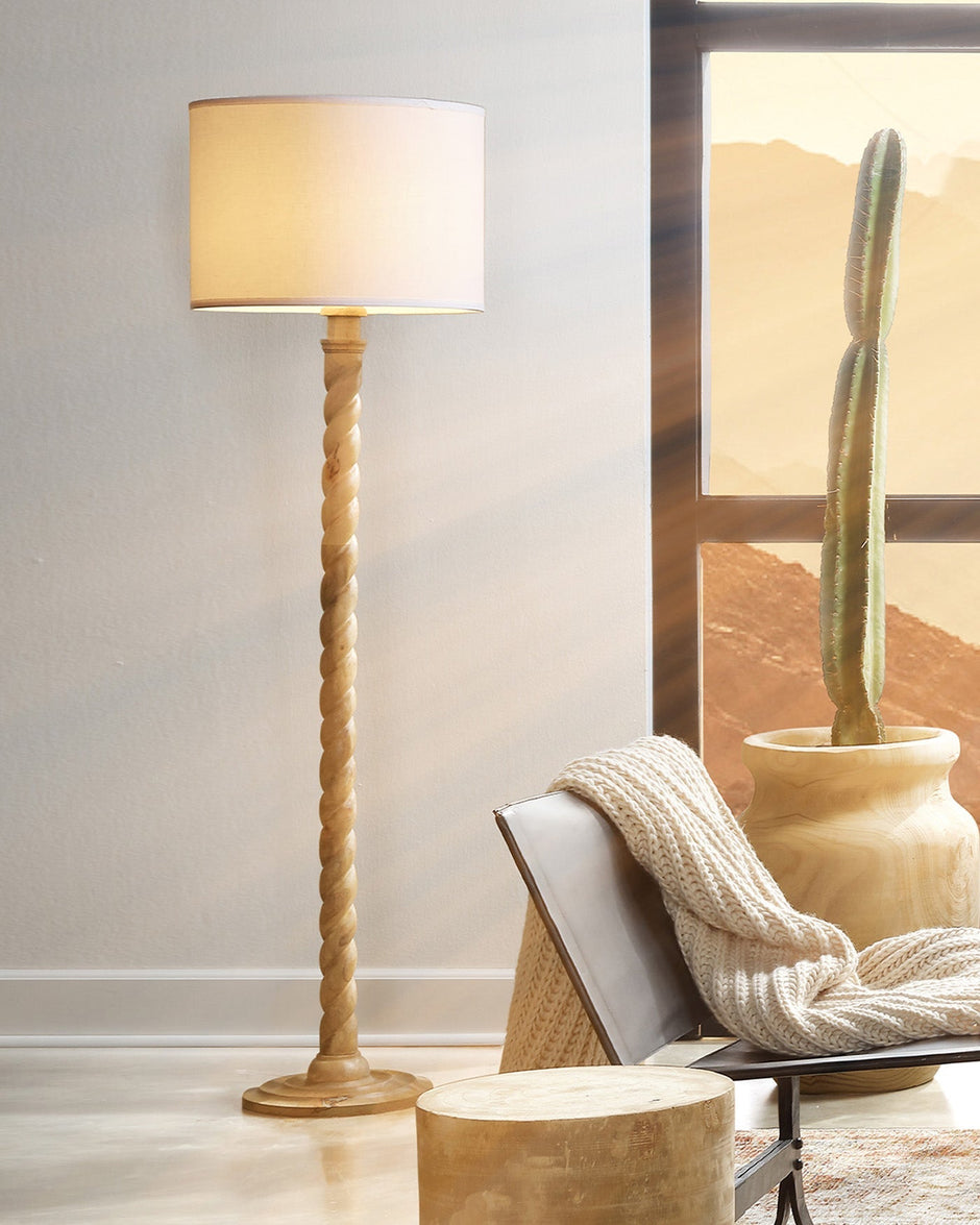Jamie Young Company Barley Twist Floor Lamp with elegant twisted wood base and fabric shade, standing tall in a stylish interior.