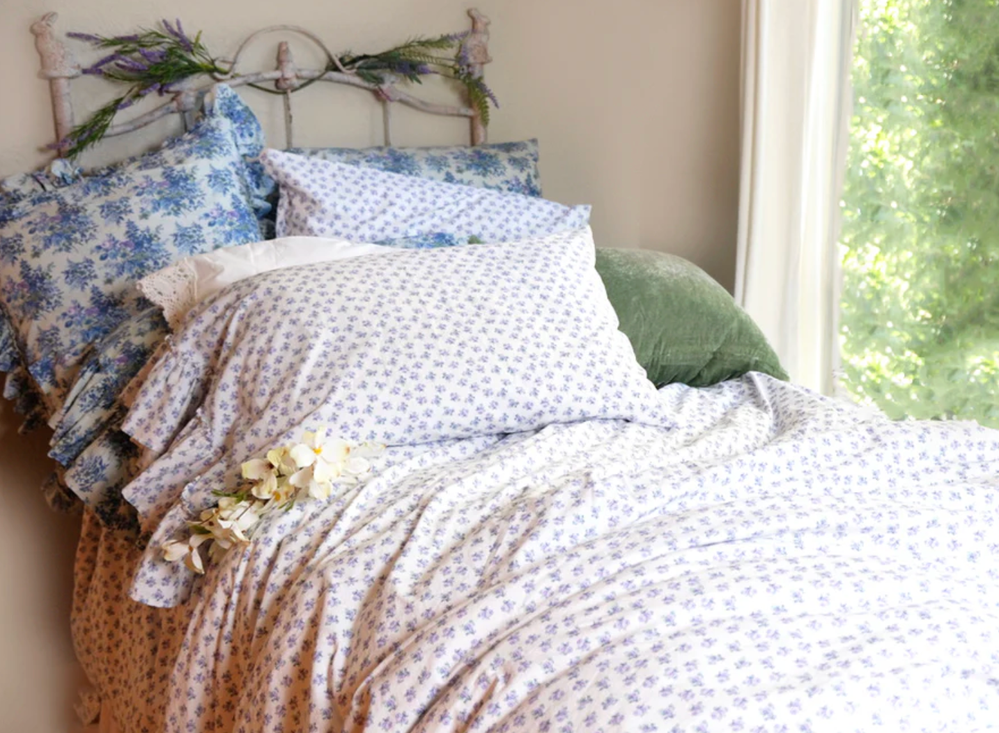Lilac Rosebud Tatter Ruffle Sham by Linen Salvage, standard size with decorative ruffles and intricate floral details.