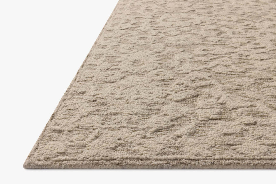 Loloi Prudence area rug in stone and ivory, 9x13 size, featuring intricate pattern and soft woven texture.