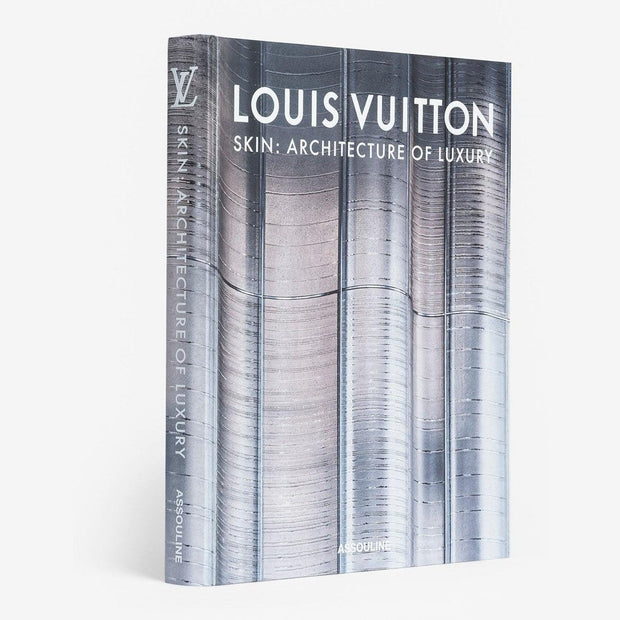 A book cover featuring the title 'Louis Vuitton Skin: Architecture of Luxury' with a metallic, reflective image of a building facade.
