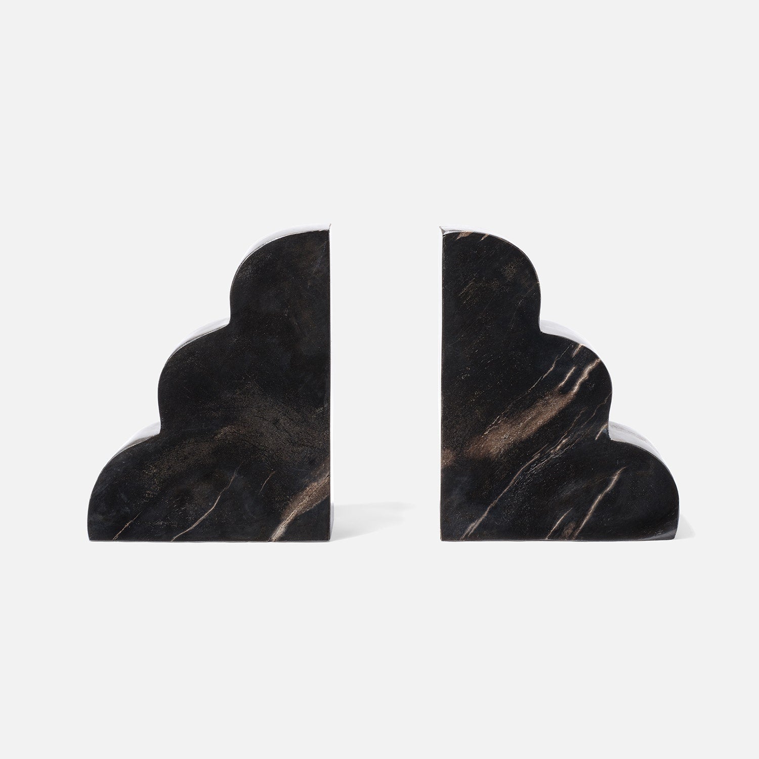 Made Goods Melina Bookend Set featuring modern, sculptural black metal design for stylish book organization.