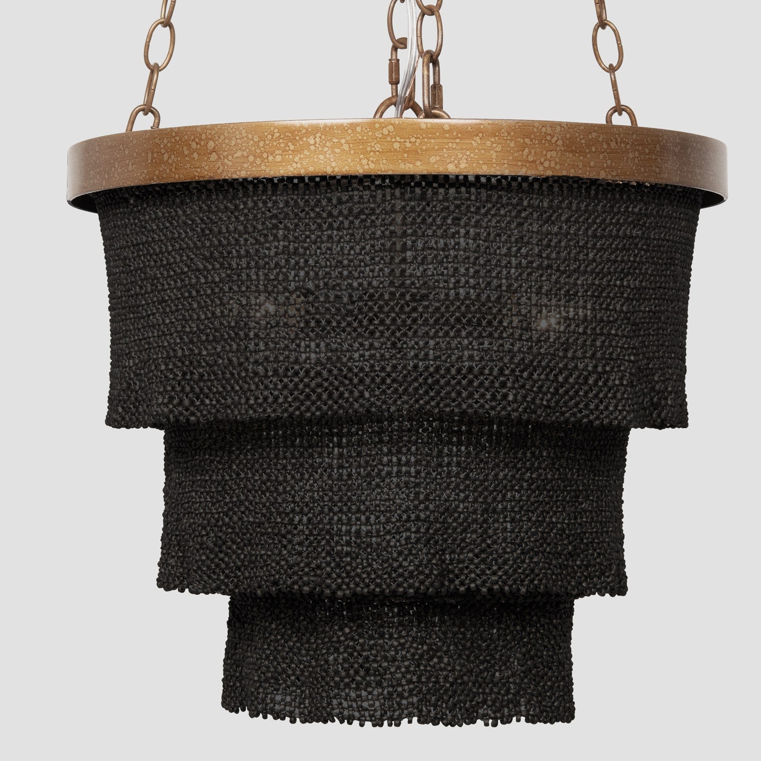 Made Goods Patricia round chandelier with multiple glass globes and brass accents hanging from a circular frame.