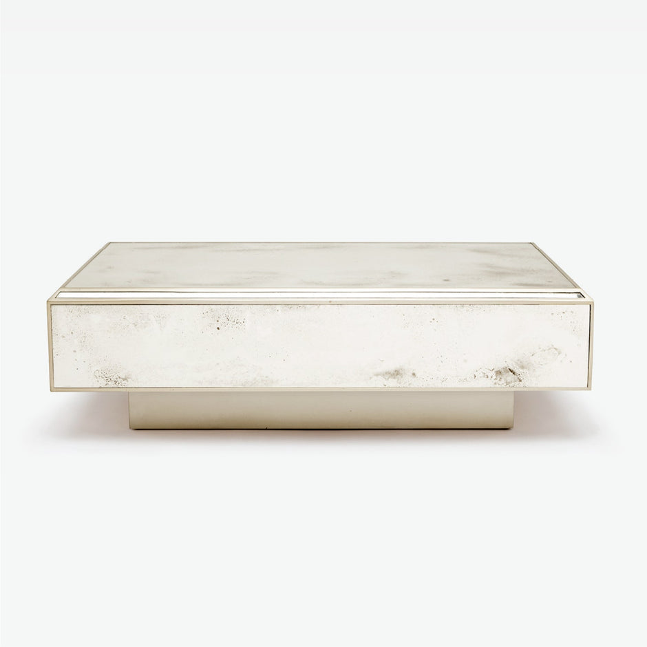 Made Goods Vanessa coffee table with a sleek, modern design featuring a smooth wooden surface and sturdy legs.