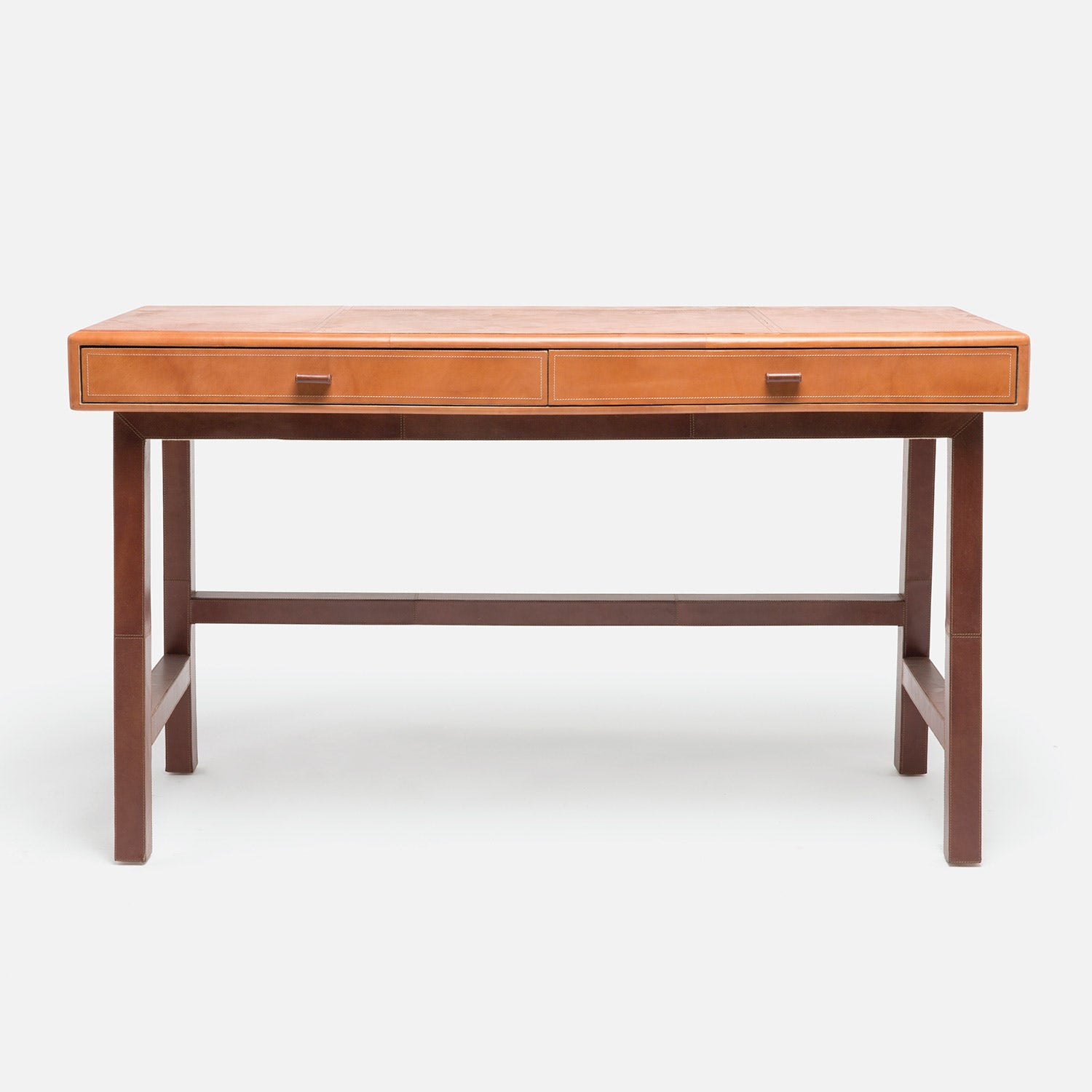 Aged camel tobacco Made Goods Kalman leather desk featuring a sleek wooden surface and sturdy leather accents.