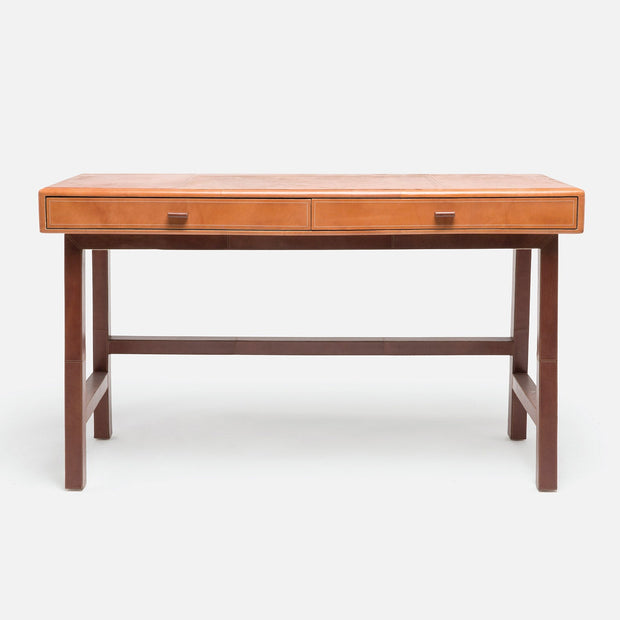 Aged camel tobacco Made Goods Kalman leather desk featuring a sleek wooden surface and sturdy leather accents.