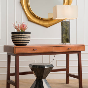 Aged camel leather Made Goods Kalman desk with sleek wooden legs, showcasing a modern, sophisticated office workspace.
