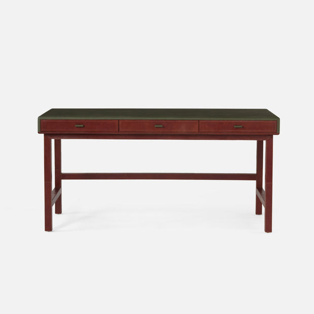 Made Goods Axton Desk with a wood finish and leather accents, showcasing its sleek design and craftsmanship.