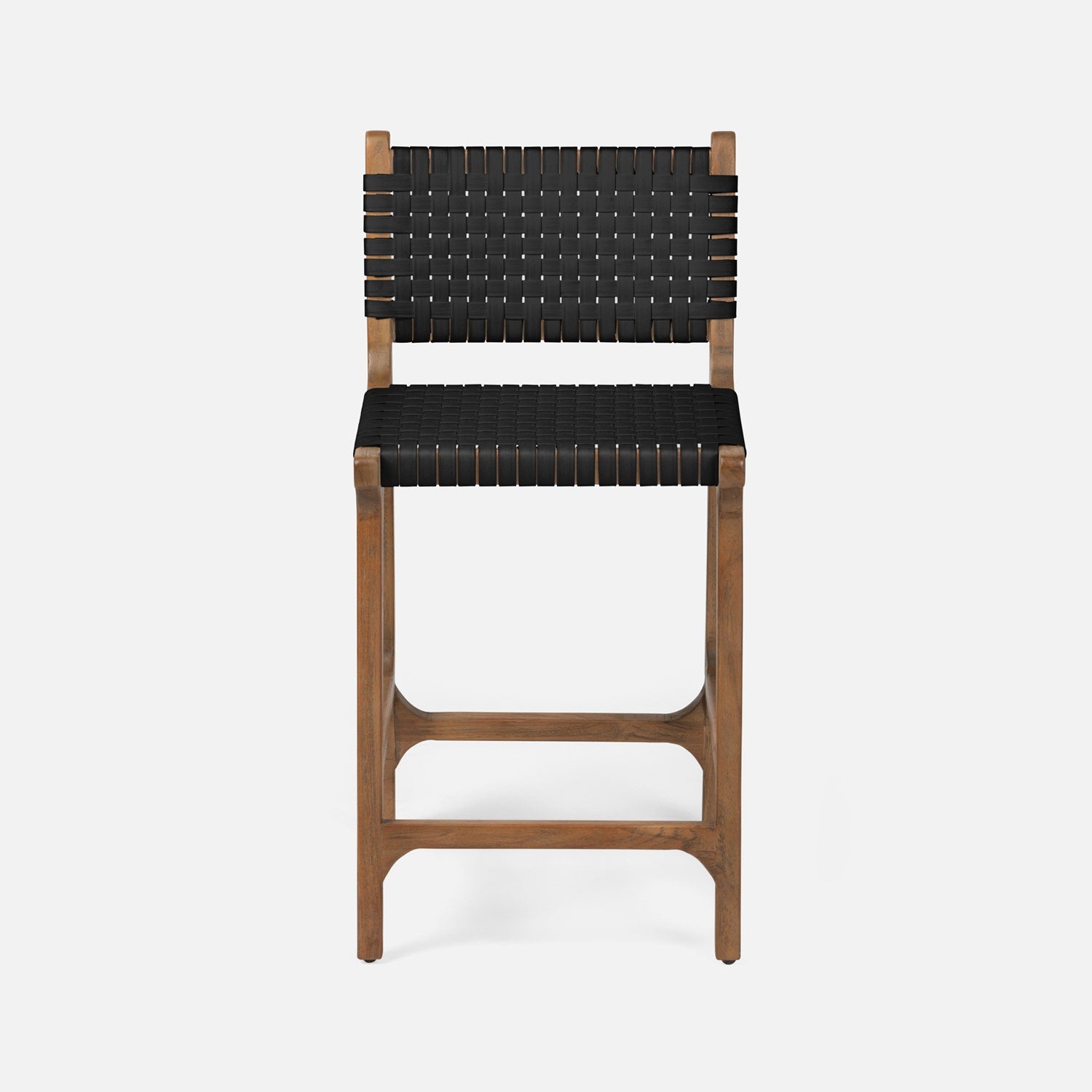 Made Goods Rawley counter stool with aged natural teak frame and black faux rattan seat, showcasing a stylish dining chair design.