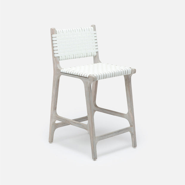 Made Goods Rawley counter stool with aged natural teak frame and black faux rattan seating, ideal as a stylish dining chair.