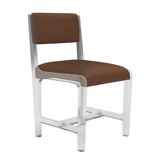 Made Goods Decker Dining Chair with wooden frame and upholstered seat, showcasing modern design and natural wood finish.