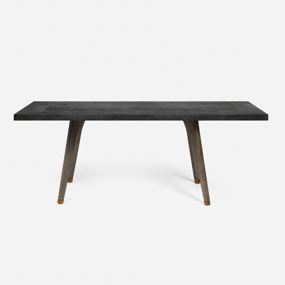 Made Goods Alder Dining Table showcasing a sleek wooden surface and modern design for contemporary dining spaces.