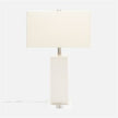 A contemporary table lamp with a woven jute column, resin finish, and a crystal base, topped with a white rectangular lampshade.