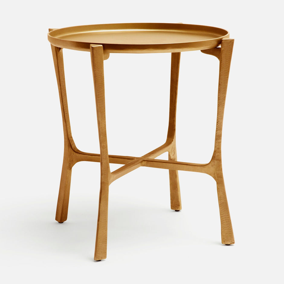 Made Goods Addison large side table in aged brass with a sleek, modern design and sturdy metal frame.