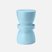 Made Goods Binx Stool side table in soft blue with a sleek, rounded design and smooth surface, ideal for modern living spaces.